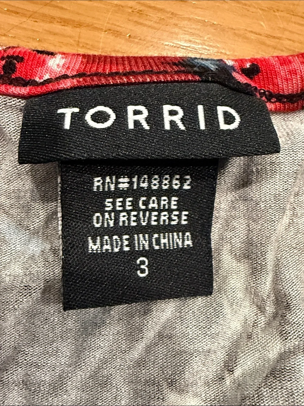 Torrid Babydoll super soft floral button down size 3 .